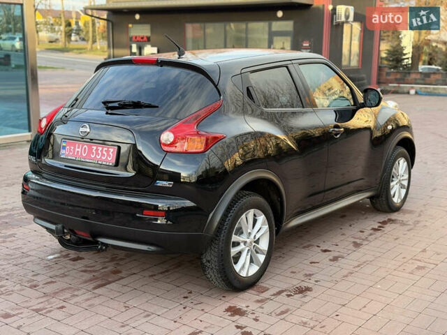 Черный Ниссан Жук, объемом двигателя 1.5 л и пробегом 184 тыс. км за 8900 $, фото 3 на Automoto.ua