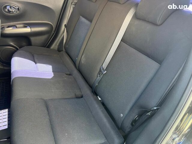 Черный Ниссан Жук, объемом двигателя 1.6 л и пробегом 115 тыс. км за 10030 $, фото 16 на Automoto.ua