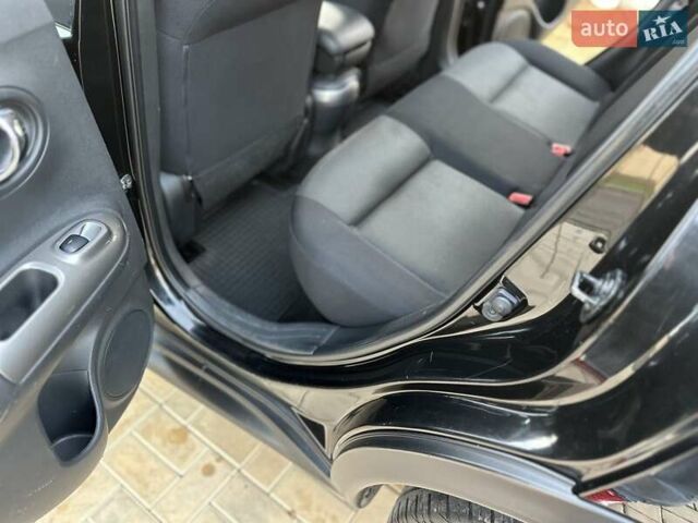 Черный Ниссан Жук, объемом двигателя 1.6 л и пробегом 117 тыс. км за 9900 $, фото 56 на Automoto.ua