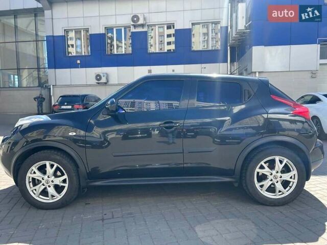 Черный Ниссан Жук, объемом двигателя 1.6 л и пробегом 115 тыс. км за 10030 $, фото 11 на Automoto.ua