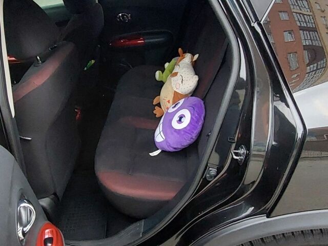 Черный Ниссан Жук, объемом двигателя 1.6 л и пробегом 124 тыс. км за 10700 $, фото 10 на Automoto.ua