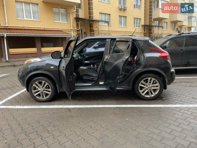 Черный Ниссан Жук, объемом двигателя 1.6 л и пробегом 270 тыс. км за 8500 $, фото 10 на Automoto.ua