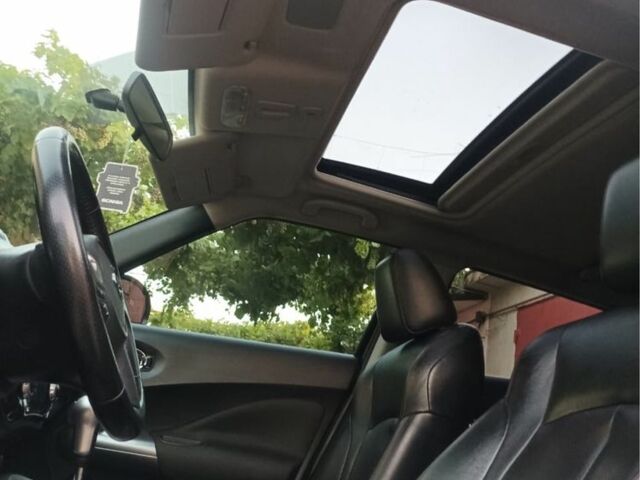 Черный Ниссан Жук, объемом двигателя 1.6 л и пробегом 160 тыс. км за 9150 $, фото 2 на Automoto.ua