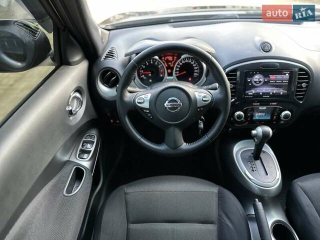 Черный Ниссан Жук, объемом двигателя 1.6 л и пробегом 117 тыс. км за 9900 $, фото 25 на Automoto.ua