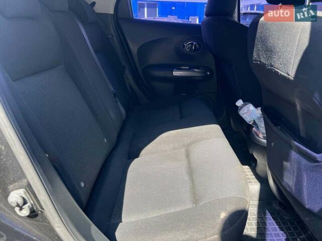 Черный Ниссан Жук, объемом двигателя 1.6 л и пробегом 115 тыс. км за 10030 $, фото 18 на Automoto.ua