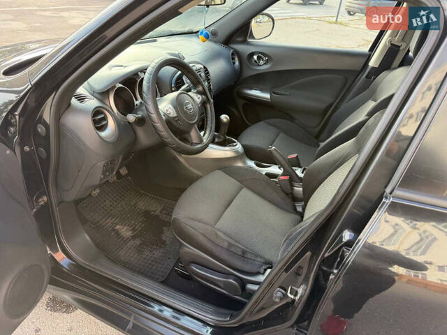 Черный Ниссан Жук, объемом двигателя 1.6 л и пробегом 187 тыс. км за 7700 $, фото 12 на Automoto.ua