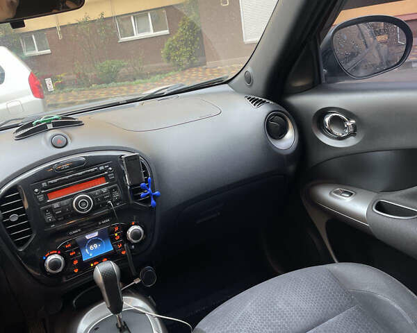 Черный Ниссан Жук, объемом двигателя 1.6 л и пробегом 270 тыс. км за 8500 $, фото 8 на Automoto.ua