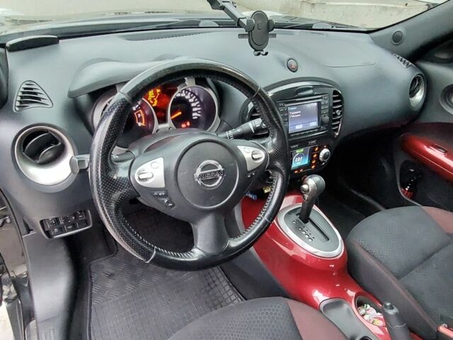 Черный Ниссан Жук, объемом двигателя 1.6 л и пробегом 124 тыс. км за 10700 $, фото 6 на Automoto.ua