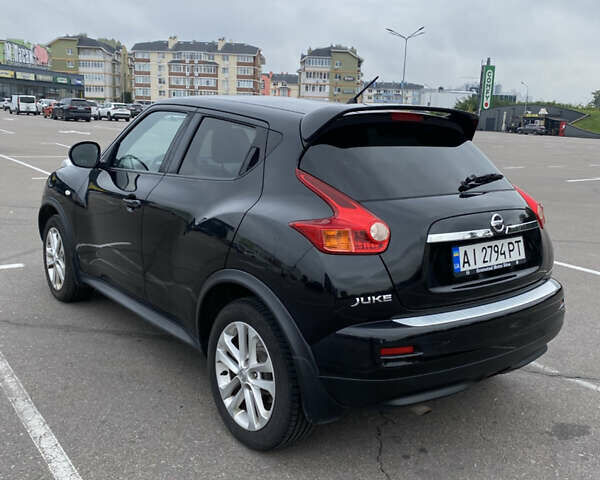 Черный Ниссан Жук, объемом двигателя 1.6 л и пробегом 120 тыс. км за 8300 $, фото 5 на Automoto.ua