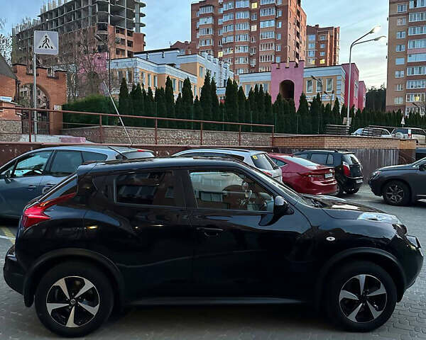 Чорний Ніссан Жук, об'ємом двигуна 1.6 л та пробігом 164 тис. км за 10300 $, фото 5 на Automoto.ua