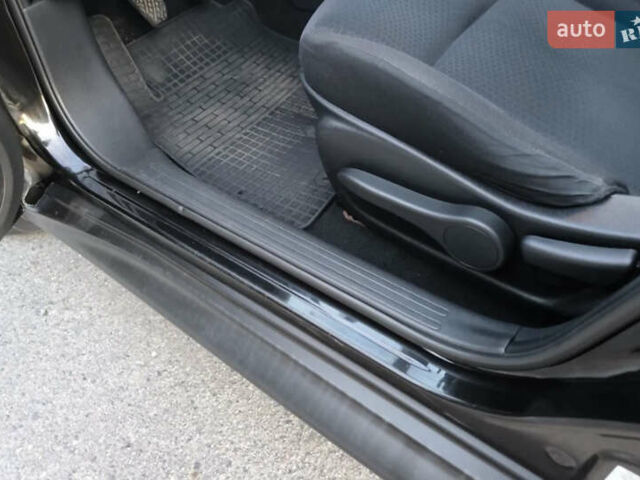 Черный Ниссан Жук, объемом двигателя 1.6 л и пробегом 153 тыс. км за 9500 $, фото 7 на Automoto.ua