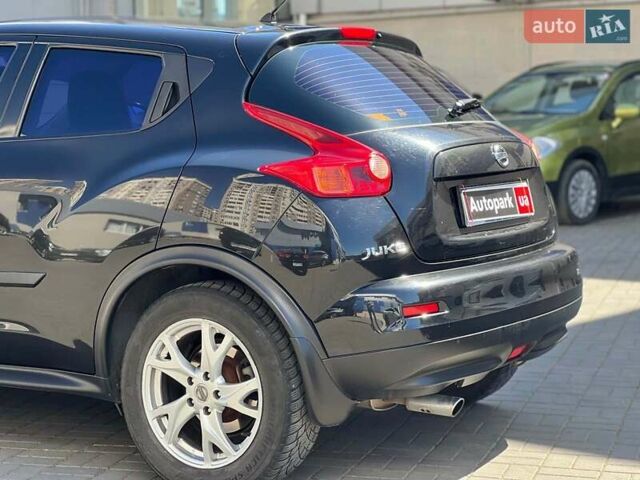 Черный Ниссан Жук, объемом двигателя 1.6 л и пробегом 115 тыс. км за 10030 $, фото 9 на Automoto.ua