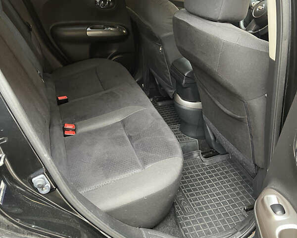 Черный Ниссан Жук, объемом двигателя 1.6 л и пробегом 270 тыс. км за 8500 $, фото 6 на Automoto.ua