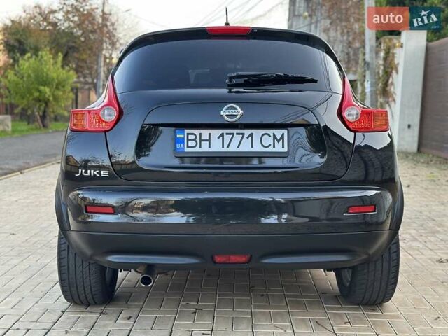 Черный Ниссан Жук, объемом двигателя 1.6 л и пробегом 117 тыс. км за 9900 $, фото 16 на Automoto.ua