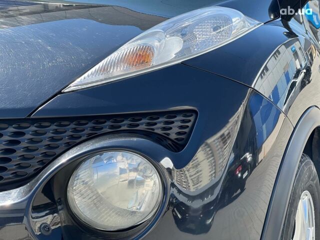 Черный Ниссан Жук, объемом двигателя 1.6 л и пробегом 115 тыс. км за 10030 $, фото 2 на Automoto.ua