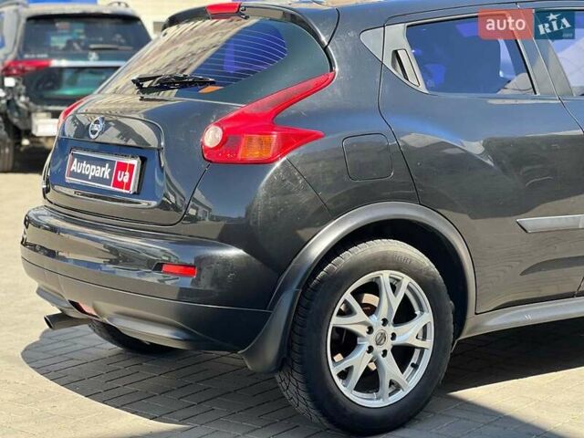 Черный Ниссан Жук, объемом двигателя 1.6 л и пробегом 115 тыс. км за 10030 $, фото 5 на Automoto.ua