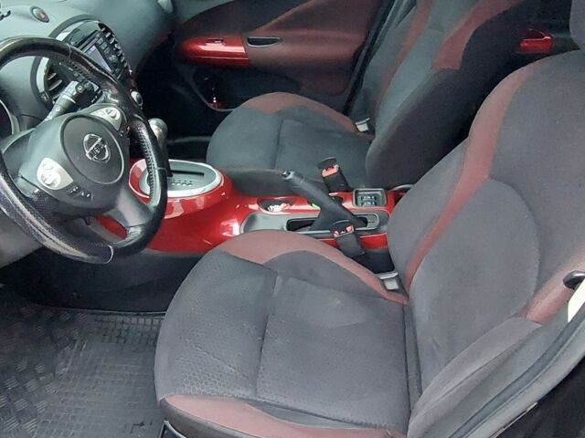 Черный Ниссан Жук, объемом двигателя 1.6 л и пробегом 124 тыс. км за 10700 $, фото 7 на Automoto.ua