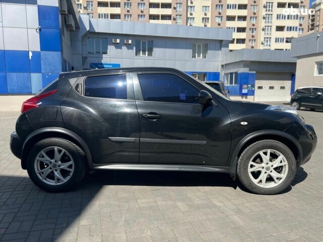 Черный Ниссан Жук, объемом двигателя 1.6 л и пробегом 115 тыс. км за 10030 $, фото 6 на Automoto.ua