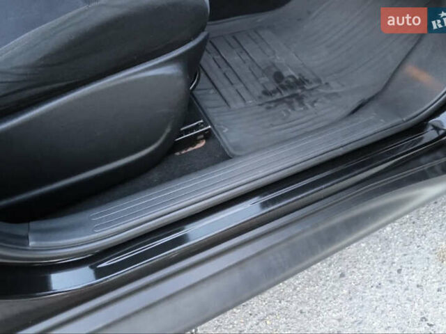 Черный Ниссан Жук, объемом двигателя 1.6 л и пробегом 153 тыс. км за 9500 $, фото 9 на Automoto.ua