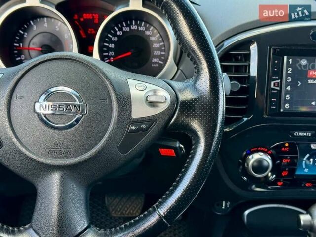 Чорний Ніссан Жук, об'ємом двигуна 1.6 л та пробігом 88 тис. км за 9700 $, фото 24 на Automoto.ua