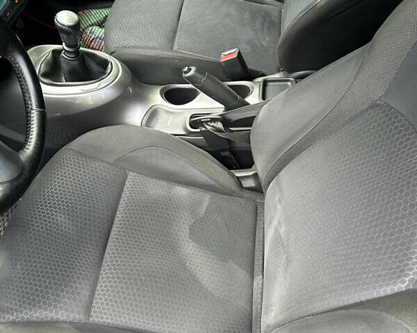 Черный Ниссан Жук, объемом двигателя 1.46 л и пробегом 160 тыс. км за 7550 $, фото 17 на Automoto.ua