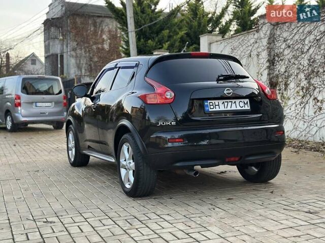 Черный Ниссан Жук, объемом двигателя 1.6 л и пробегом 117 тыс. км за 9900 $, фото 20 на Automoto.ua