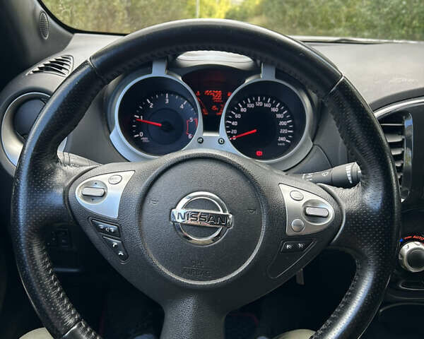 Черный Ниссан Жук, объемом двигателя 1.46 л и пробегом 160 тыс. км за 7550 $, фото 19 на Automoto.ua