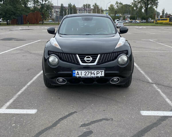 Черный Ниссан Жук, объемом двигателя 1.6 л и пробегом 120 тыс. км за 8300 $, фото 1 на Automoto.ua