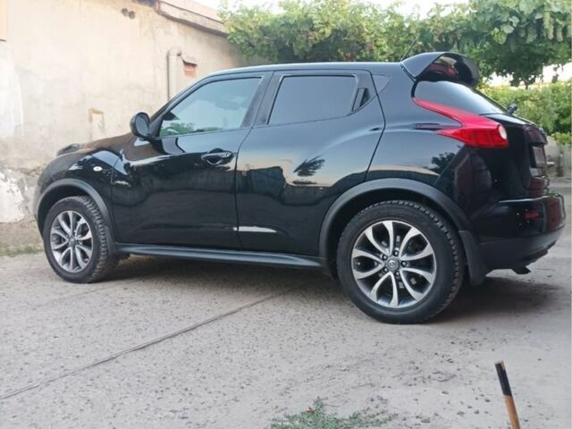 Черный Ниссан Жук, объемом двигателя 1.6 л и пробегом 160 тыс. км за 9150 $, фото 7 на Automoto.ua