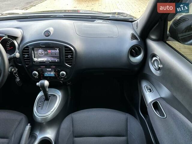 Черный Ниссан Жук, объемом двигателя 1.6 л и пробегом 117 тыс. км за 9900 $, фото 26 на Automoto.ua
