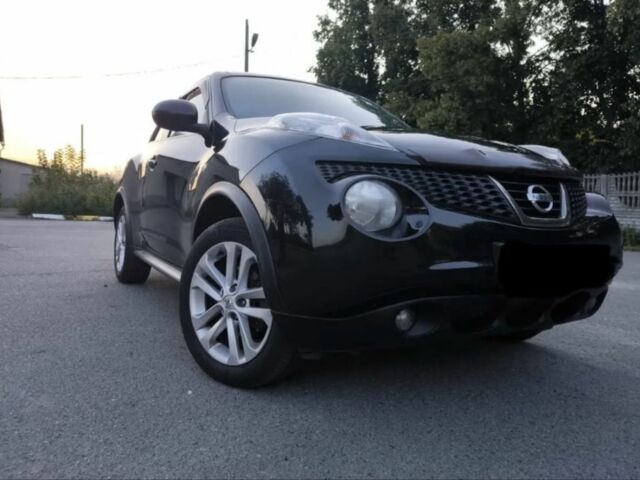 Черный Ниссан Жук, объемом двигателя 1.6 л и пробегом 153 тыс. км за 9500 $, фото 1 на Automoto.ua