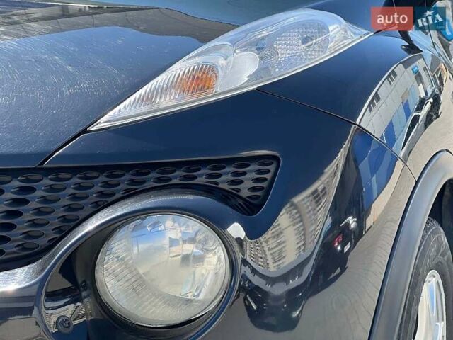 Черный Ниссан Жук, объемом двигателя 1.6 л и пробегом 115 тыс. км за 10030 $, фото 13 на Automoto.ua