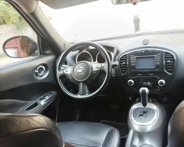 Черный Ниссан Жук, объемом двигателя 1.6 л и пробегом 160 тыс. км за 9300 $, фото 11 на Automoto.ua