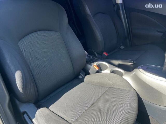 Черный Ниссан Жук, объемом двигателя 1.6 л и пробегом 115 тыс. км за 10030 $, фото 26 на Automoto.ua