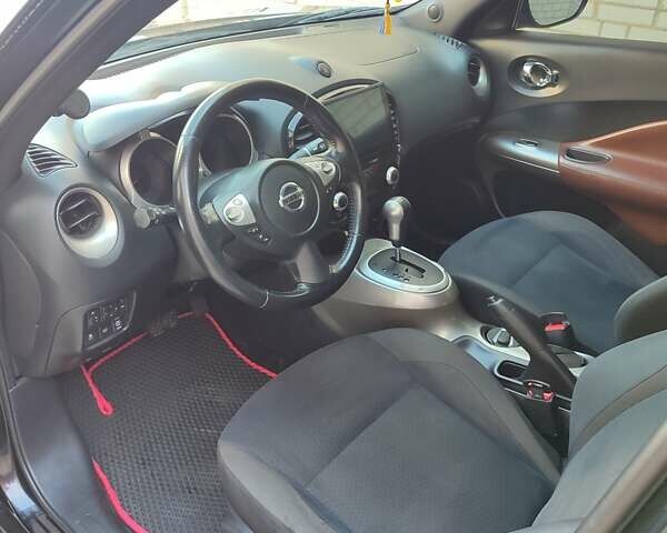 Чорний Ніссан Жук, об'ємом двигуна 1.62 л та пробігом 124 тис. км за 10000 $, фото 4 на Automoto.ua