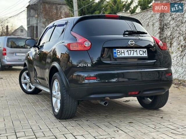 Черный Ниссан Жук, объемом двигателя 1.6 л и пробегом 117 тыс. км за 9900 $, фото 8 на Automoto.ua