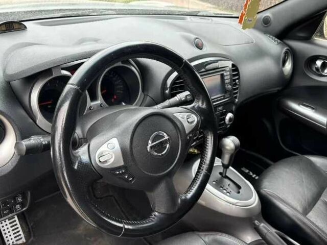 Черный Ниссан Жук, объемом двигателя 1.6 л и пробегом 115 тыс. км за 6500 $, фото 10 на Automoto.ua