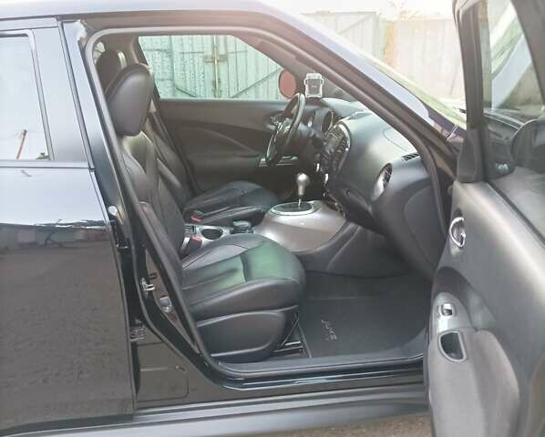 Черный Ниссан Жук, объемом двигателя 1.6 л и пробегом 160 тыс. км за 9300 $, фото 1 на Automoto.ua