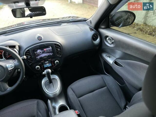 Черный Ниссан Жук, объемом двигателя 1.6 л и пробегом 117 тыс. км за 9900 $, фото 23 на Automoto.ua