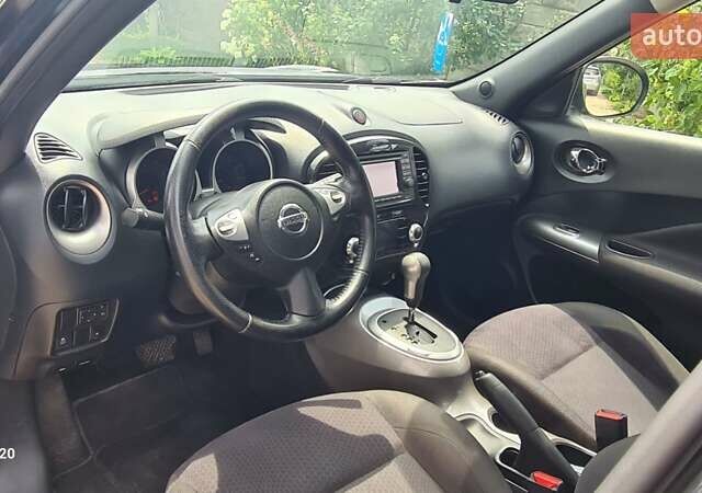 Черный Ниссан Жук, объемом двигателя 1.6 л и пробегом 151 тыс. км за 8998 $, фото 3 на Automoto.ua