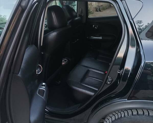 Черный Ниссан Жук, объемом двигателя 1.6 л и пробегом 160 тыс. км за 9300 $, фото 13 на Automoto.ua