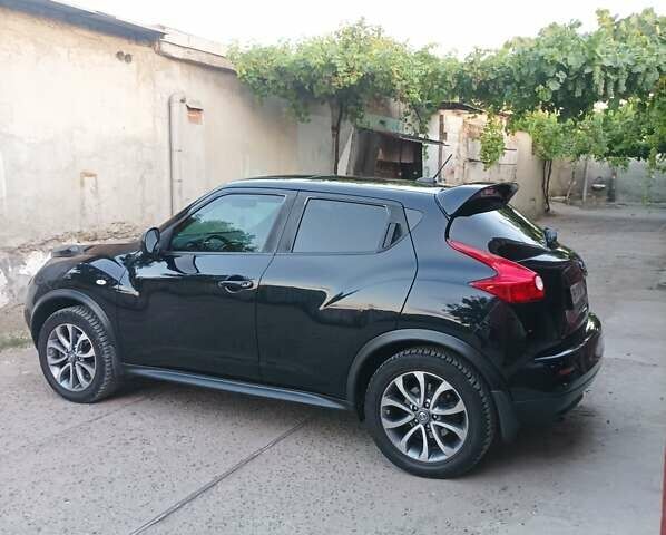 Черный Ниссан Жук, объемом двигателя 1.6 л и пробегом 160 тыс. км за 9300 $, фото 5 на Automoto.ua