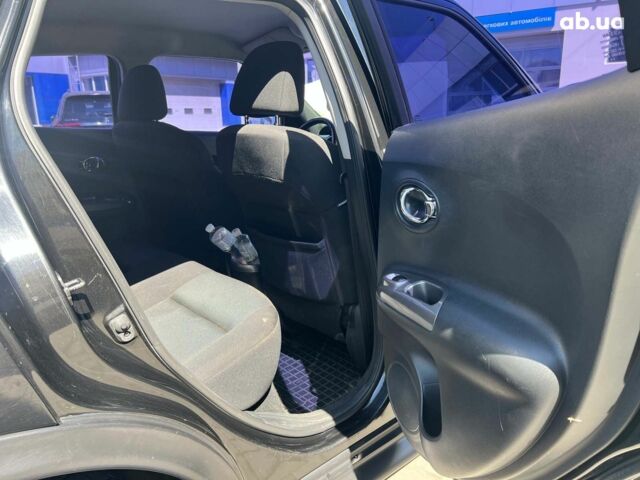 Черный Ниссан Жук, объемом двигателя 1.6 л и пробегом 115 тыс. км за 10030 $, фото 17 на Automoto.ua