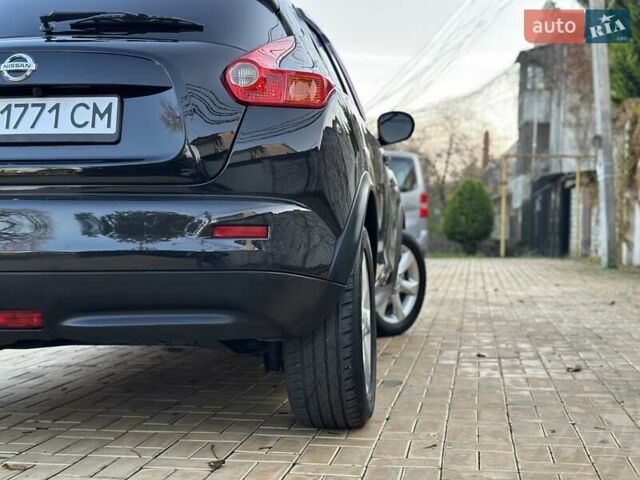 Черный Ниссан Жук, объемом двигателя 1.6 л и пробегом 117 тыс. км за 9900 $, фото 13 на Automoto.ua