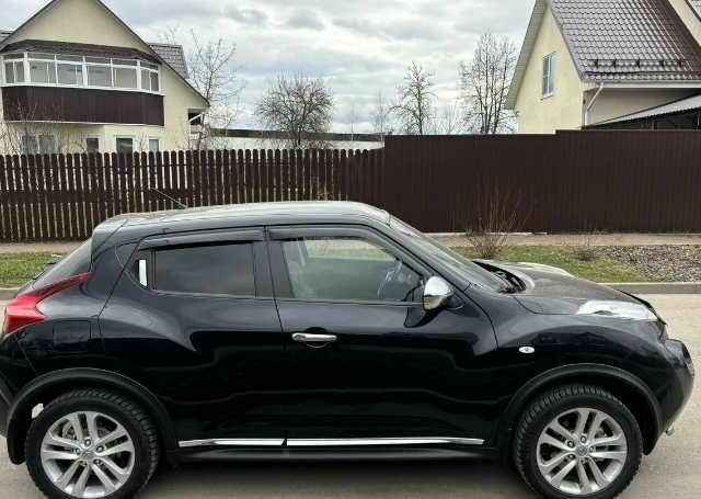 Черный Ниссан Жук, объемом двигателя 1.6 л и пробегом 115 тыс. км за 6500 $, фото 6 на Automoto.ua