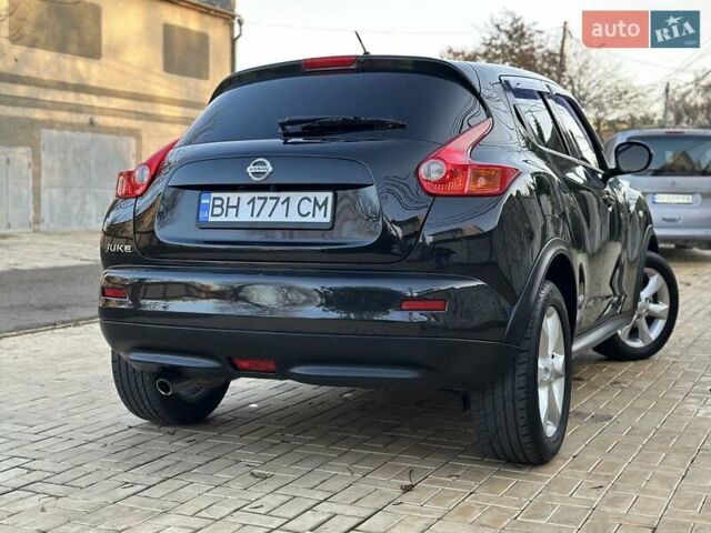 Черный Ниссан Жук, объемом двигателя 1.6 л и пробегом 117 тыс. км за 9900 $, фото 7 на Automoto.ua