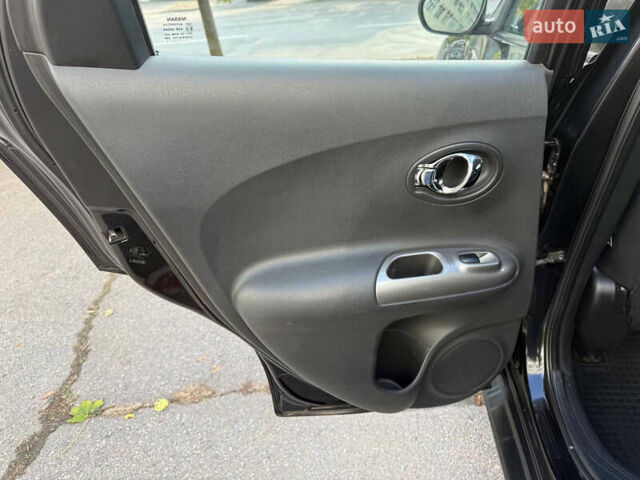 Черный Ниссан Жук, объемом двигателя 1.6 л и пробегом 187 тыс. км за 7700 $, фото 16 на Automoto.ua