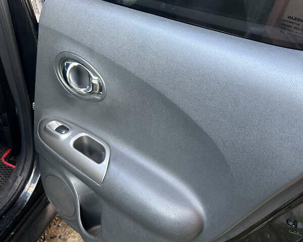 Черный Ниссан Жук, объемом двигателя 1.46 л и пробегом 158 тыс. км за 8250 $, фото 20 на Automoto.ua