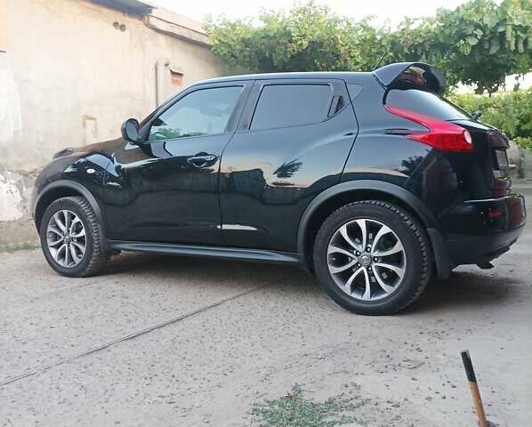 Черный Ниссан Жук, объемом двигателя 1.6 л и пробегом 160 тыс. км за 9300 $, фото 7 на Automoto.ua