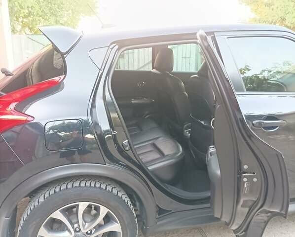 Черный Ниссан Жук, объемом двигателя 1.6 л и пробегом 160 тыс. км за 9300 $, фото 2 на Automoto.ua